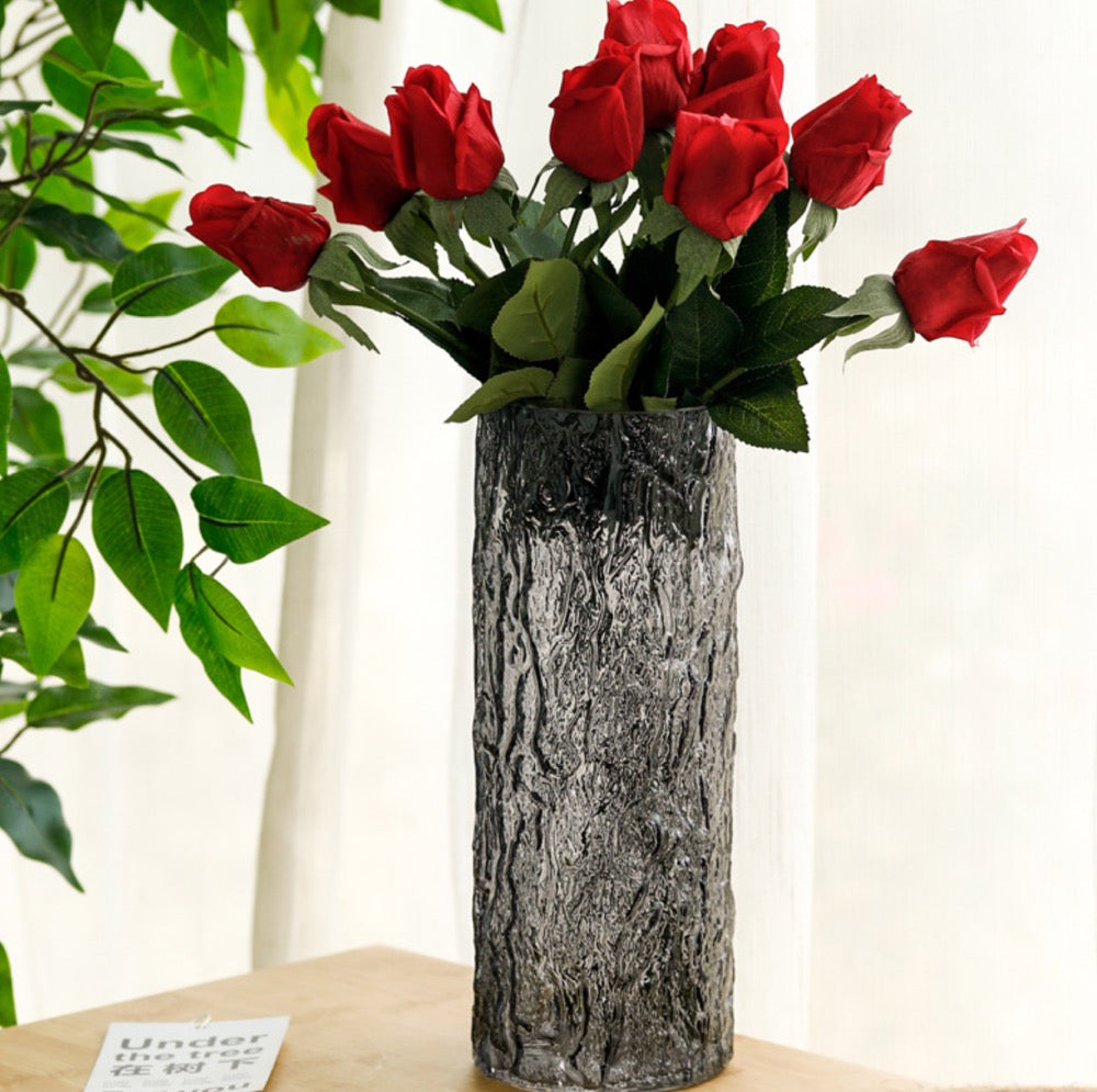 High-looking straight glass vase
