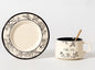 Retro style ceramic coffee cup and saucer