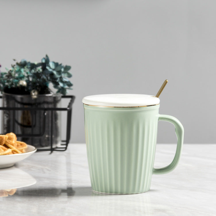 Minimally striped ceramic cup
