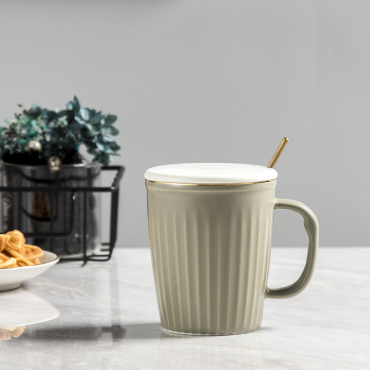 Minimally striped ceramic cup