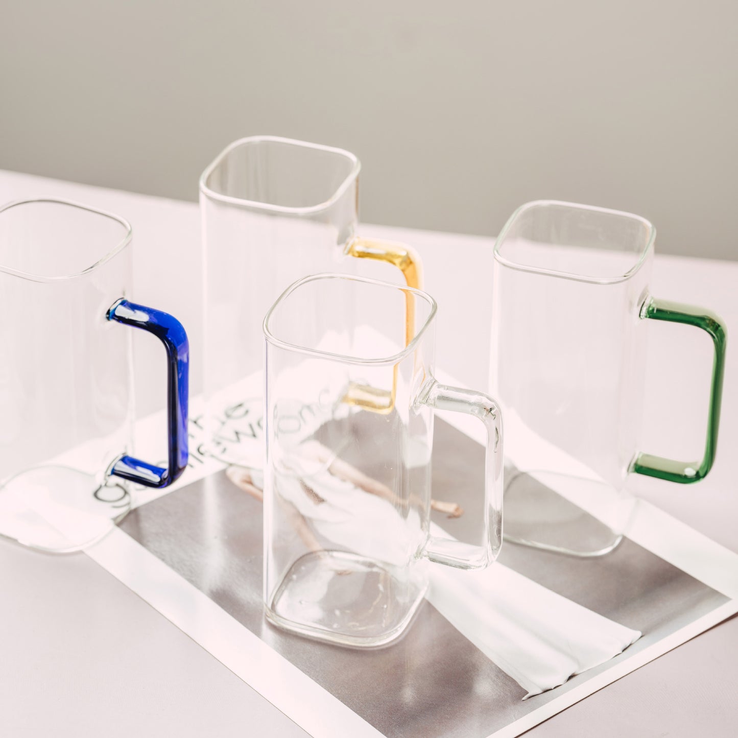 Heat resistant glass cup with handle and no cover