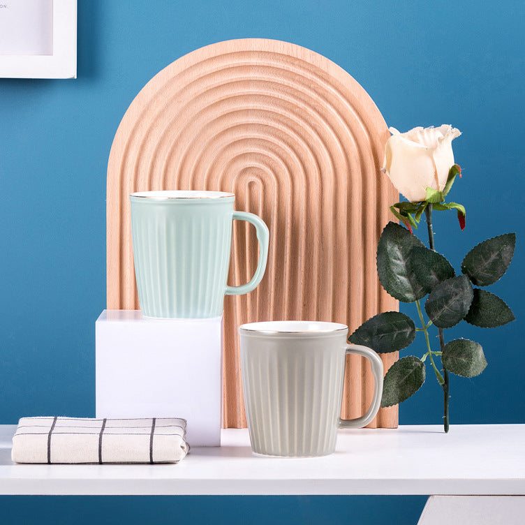 Minimally striped ceramic cup